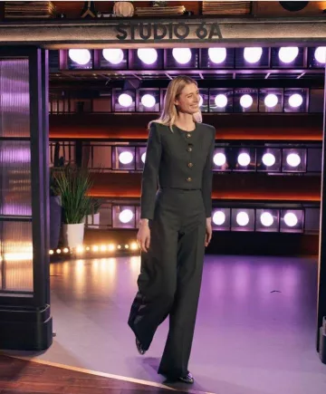 Carolina Herrera Cropped Stretch-Wool Jacket worn by  Elizabeth Debicki at The Kelly Clarkson Show on July 8, 2024