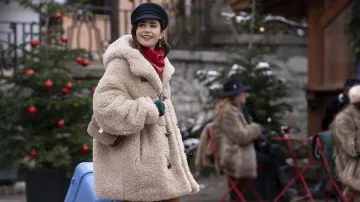 Emily in Paris Season 4 Outfits: Emily Cooper (Lily Collins) is wearing Isabel Marant Etoile Shearling Hooded Jacket