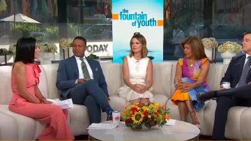 Vince Camuto Bow Neck Stretch Crepe Jumpsuit in Papaya worn by Vicky Nguyen as seen in Today on  July 9, 2024