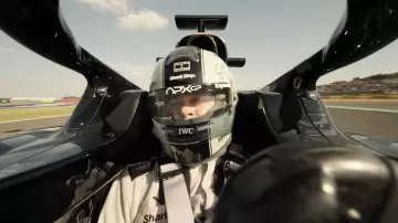 F1 Movie Accessories: Brad Pitt wears APXGP Bell F1 Racing Helmet to play Sonny Hayes as a racing driver