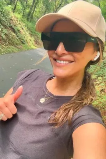 Zoe Chicco 14K Small Sunbeam Medallion Necklace worn by Andi Dorfman on her Instagram Story on July 10, 2024