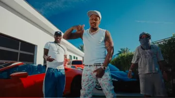 Cout De La Liberte White & Multicolor Flowers Flared Leather Jeans worn by YG in YG - Stupid (feat. Lil Yachty and Babyface Ray) [Official Music Video]
