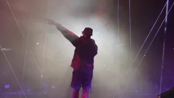 Amiri Deep Indigo Allover Logo Bucket Hat worn by Anuel AA in ANUEL AA, YOVNGCHIMI - Baby Demon (Video Oficial)