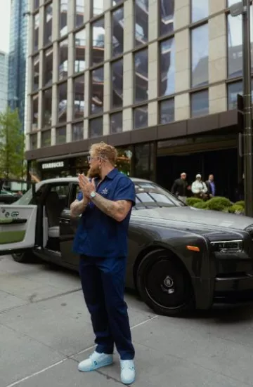 Prada Navy Blue Zip Shirt worn by Jake Paul on the Instagram account @jakepaul