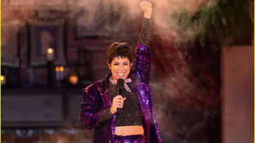 Encanto at the Hollywood Bowl Wardrobe: Jessica Darrow is wearing Caizi Grape Sequin Blazer Coat