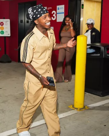 Gucci x Adidas Beige GG Side Stripe Shirt worn by Jacquees on the Instagram account @jacquees