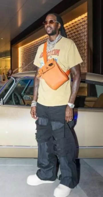 Balenciaga Black Destroyed Denim Pajama Layered Jeans worn by 2 Chainz on the Instagram account @2chainz