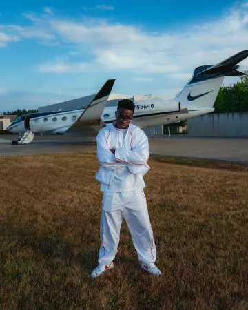 Nike X Jacquemus White Piped Trackpants worn by Vinícius Júnior on the Instagram account @vinijr