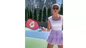 Taylor Swift is wearing Lilac short skirt on Share your “fortnight” recap with #ForAFortnightChallenge in YouTube