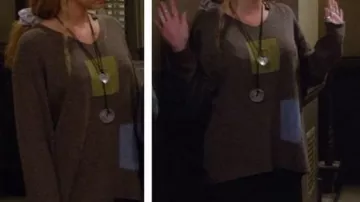 Phoebe Buffay Outfits: Lisa Kudrow wears Sweater with colored squares in season 1, episode 9 of Friends TV series