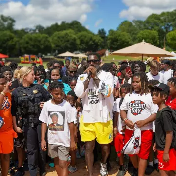 Prada Black & Silver Stripe Square Sunglasses worn by Deebo Samuel on the Instagram account @1deebosr