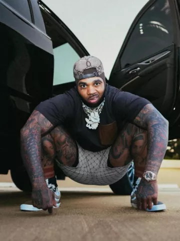 Dolce & Gabbana Dark Brown Leather Pocket T Shirt worn by Kevin Gates on the Instagram account @iamkevingates