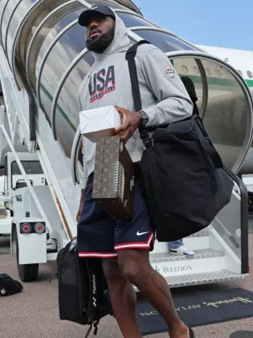 Nike Adult USA 2024 Practice Fleece Grey Hoodie worn by LeBron James on the Instagram account @nbafashionfits