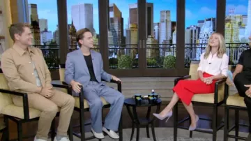 Paul Smith Tapered-Fit Tan Wool-Cotton Pleated Trousers worn by Rob Lowe as seen in LIVE with Kelly and Mark on July 24, 2024