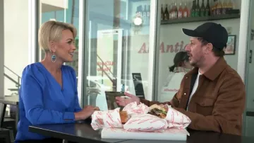 Ann Taylor Draped Sleeve V-neck Top worn by Jamie Yuccas as seen in CBS Mornings on July 23, 2024