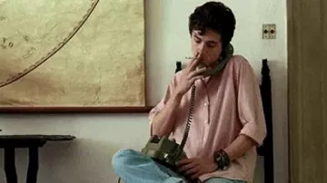 Call Me by Your Name Movie Furniture: Elio (Timothée Chalamet) is using Green Rotary Phone in the scene