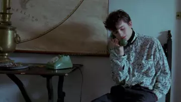 Call Me by Your Name Movie Furniture: Elio (Timothée Chalamet) is using Green Rotary Phone in the scene