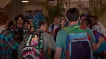 Sprayground Laffy Taffy Sharks Multicolor Backpack worn by Eli 'Hawk' Moskowitz (Jacob Bertrand) as seen in Cobra Kai (S06E01)