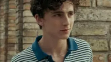 Call Me by Your Name Wardrobe: Elio (Timothée Chalamet) is wearing Striped Blue polo shirt by Lacoste