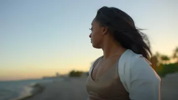 Aqua Athletic x Venus Williams Metallic V Neck Bra worn by Simone Biles as seen in Simone Biles Rising (S01E02)