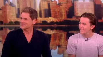 The View TV Show wardrobe: Rob Lowe is wearing Saint Laurent Shark-collar Shirt in Matte and Shiny Striped Silk on July 29, 2024