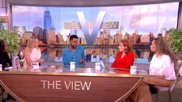 Zimmermann Luminosity Belted Wool-Blend Flare Trousers worn by Sunny Hostin as seen in The View on July 30, 2024