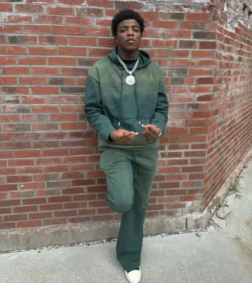 Who Decide War Pantalones de chándal acampanados de testigo verde oscuro usados por Yungeen Ace en la cuenta de Instagram @yungeenace