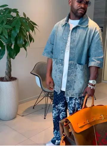 Louis Vuitton Blue Slashed Floral Print Jeans worn by Floyd Mayweather on the Instagram account @floydmayweather