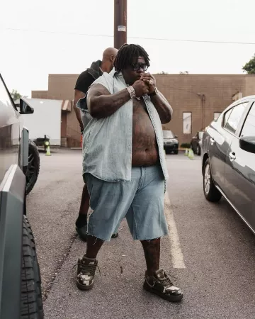 Balenciaga Light Blue Denim Baggy Skater Shorts worn by BigXthaPlug on the Instagram account @bigxthaplug