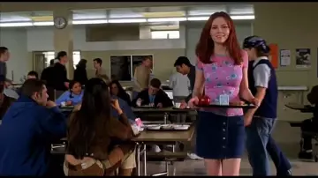 Pink Floral Print Shirt and Navy Skirt worn by Mary Jane Watson (Kirsten Dunst) in Spider-Man movie
