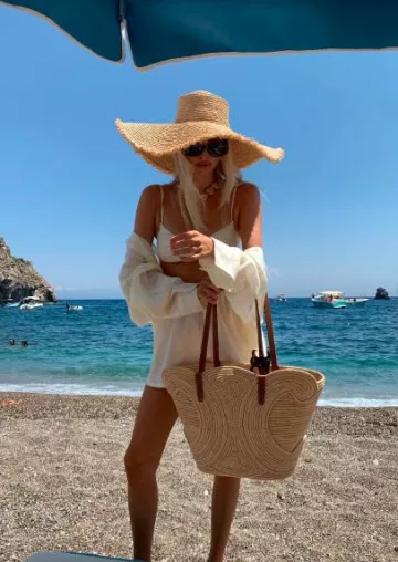 Monday Swimwear Bordeaux Top worn by  Leonie Hanne on her Instagram Post on August 5, 2024