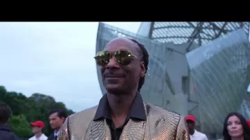 Snoop Dogg was wearing Golden Suit Jacket for The Prelude To The Paris Games 2024 : Arrivals At Fondation Louis Vuitton on July 25, 2024