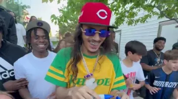 Rhude Yellow & Green-Sleeve Logo T-Shirt worn by BabyTron in BabyTron - Clownin’ (Official Video)