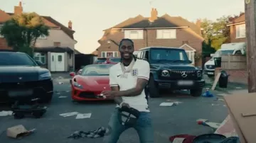 Amiri Classic Indigo Glitter Snake Jean cassé porté par Russ dans Tion Wayne x Russ Millions - We Won (Clip officiel)
