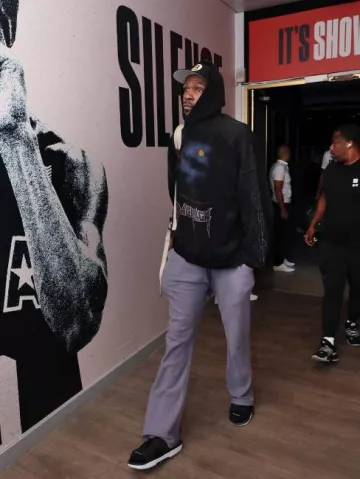 Gucci x The North Face Forest Print Cargo Backpack worn by Kevin Durant on the Instagram account @nbafashionfits