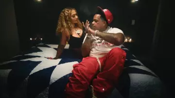 Saint Vinity Red Nylon Side Snap Trackpants worn by Finesse2tymes in Finesse2Tymes - Pretty Ricky [Official Music Video]
