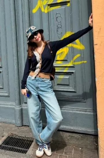 Maison Margiela Work-In-Progress Wool-Blend Cardigan worn by Taeyeon in Germany on August 6, 2024