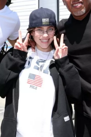 New Era x Bape NYC Logo Bape Sounds Cap worn by Billie Eilish at La28 Olympic Games Handover Celebration on August 11, 2024