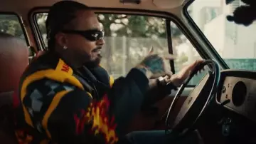 Merch Mac Tools Black Flames Racing Jacket worn by J Balvin in J Balvin, Feid - Doblexxó (Official Video)