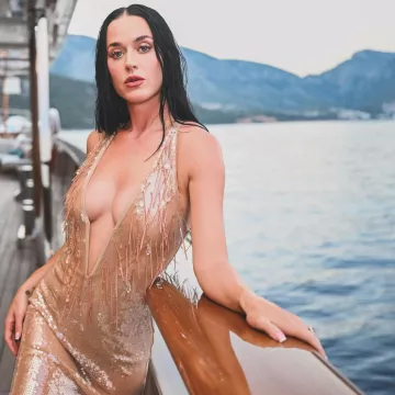Alessandro Vigilante Wet Sequined Deep V Neck Midi Dress worn by Katy Perry on her Instagram on August 13, 2024