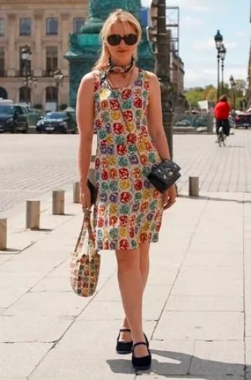 Chanel Camellia Print Bag In Multicolour worn by  Kathryn Newton in Paris France on August 9, 2024
