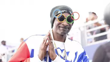 Snoop Dogg is wearing Olympics sunglasses for the Men's Skateboarding Park Final on day twelve of the Olympic Games Paris 2024 at Place de la Concorde on August 07 2024 in Paris