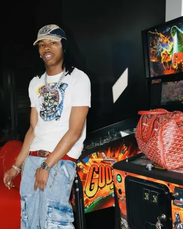 Louis Vuitton x Tyler The Creator Cream Monogram Christopher Backpack worn by Lil Baby on the Instagram account cbfw2040 Spotern