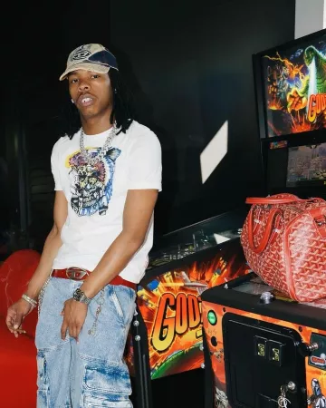 Diesel White & Multicolor Tattoo Print T Shirt worn by Lil Baby on the Instagram account @cbfw2040