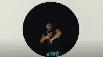 Louis Vuitton Black Racing Logos Cargo Jeans worn by Myke Towers in Myke Towers & Darell - OTRA NOCHE (Video Oficial)