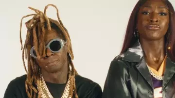 Balenciaga Grey Round Twist Sunglasses worn by Lil Wayne in Flau'jae, Lil Wayne - Came Out A Beast (Official Music Video)