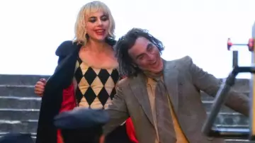 Joaquin Phoenix wears Grey Suit and Yellow Shirt to portray Arthur Fleck on the set of Joker: Folie à deux in New York on March 26, 2023