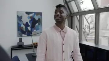 Emily in Paris Outfits: Julien (Samuel Arnold) is wearing Pink Striped Cardigan in season 4, episode 2