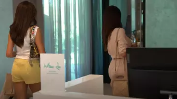 Themoire Clori Woven Straw Top-Handle Bag worn by Sara Al Madani as seen in The Real Housewives of Dubai (S02E12)