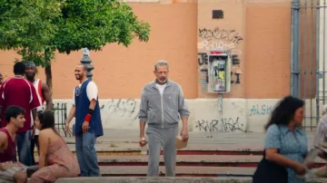 Celine Triomphe tracksuit Jacket in velvet jersey worn by Zeus (Jeff Goldblum) as seen in KAOS (S01E02)